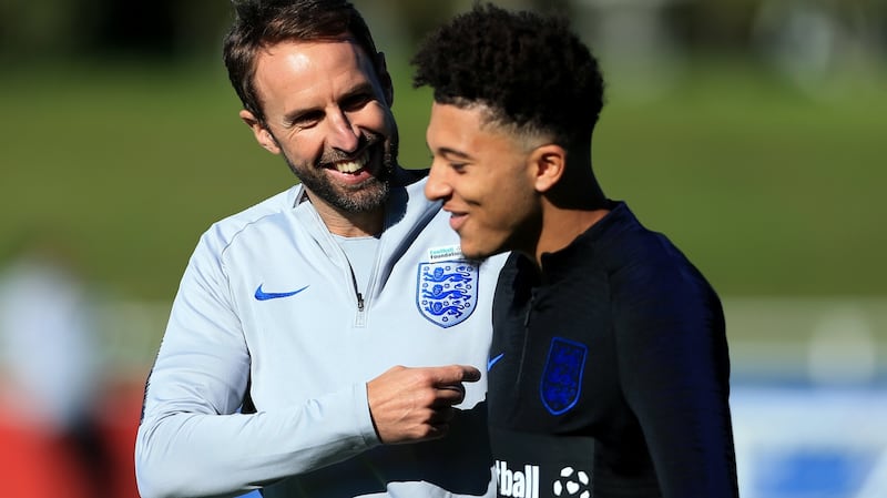 England manager Gareth Southgate with Jadon Sancho: He has stepped away from being ‘merely’ a coach concerned with tactics and winning matches into a national figure with national attitude. Photograph: Simon Stacpoole/Offside/Getty Images