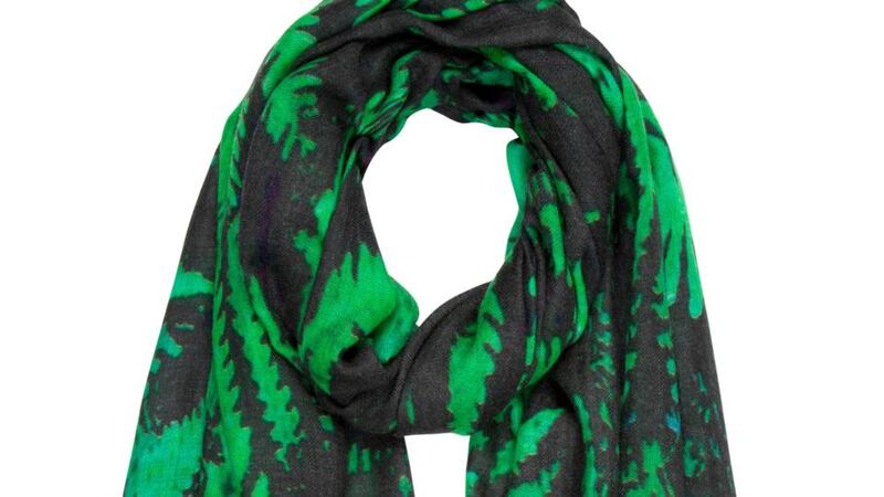 A green and black forest fern print wool scarf by KDK for €90. For stockists visit kdk.ie