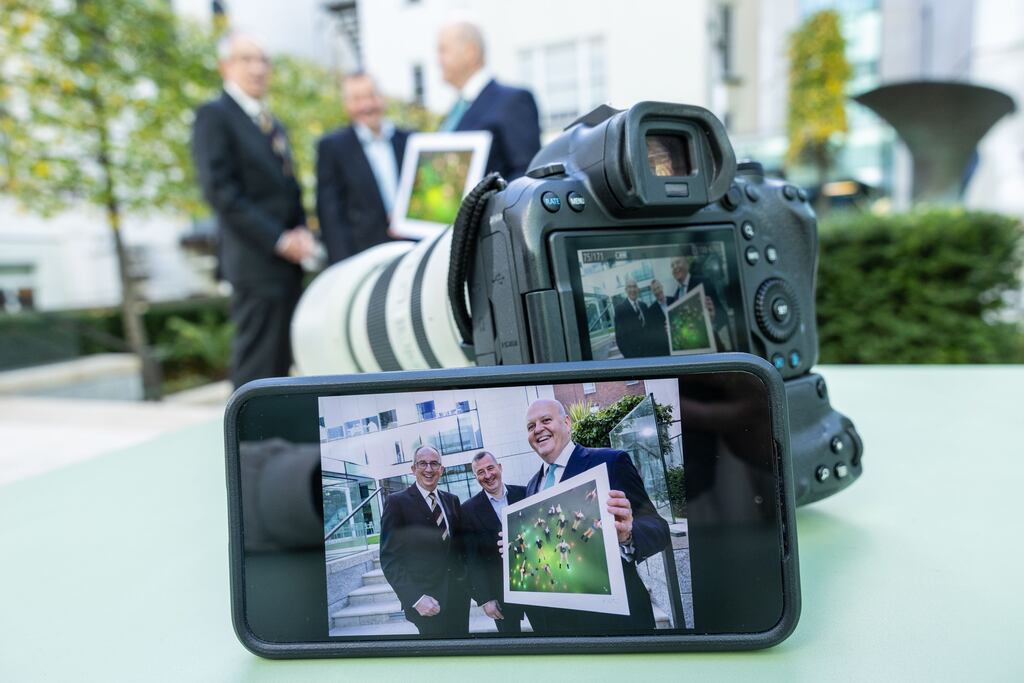 Press Photographers Ireland president David Branigan with this year's press photographer of the year, Alan Betson of The Irish Times, and Colin Hunt, chief executive of sponsor AIB, as entries to the 2025 awards open. Photograph: Orla Murray/Coalesce