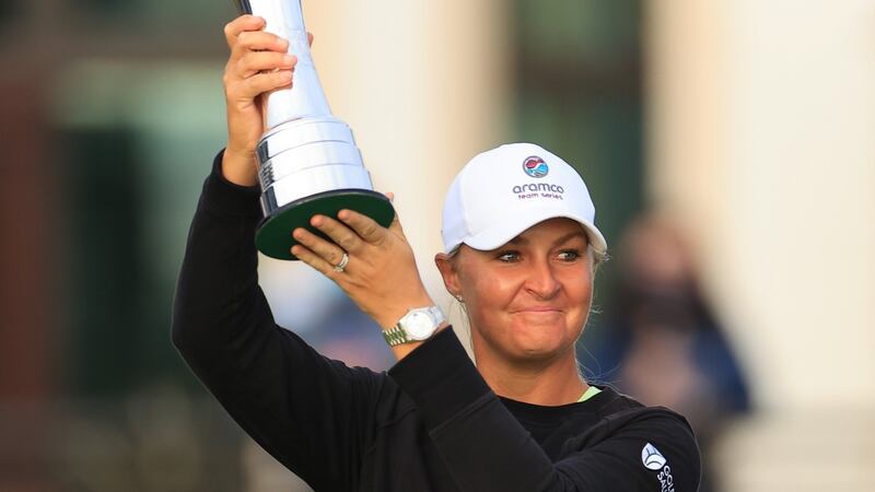 Sweden’s Anna Nordqvist lifts the trophy after her win at Carnoustie. Photograph: David Cannon/Getty