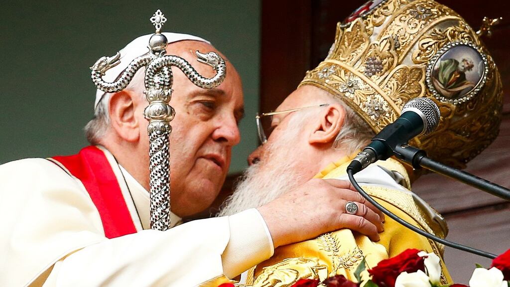 Pope Francis and Ecumenical Patriarch Bartholomew I of Constantinople embrace after the Divine Liturgy at the Ecumenical Patriarchate in Istanbul on Sunday. Photograph: Tony Gentile/Reuters