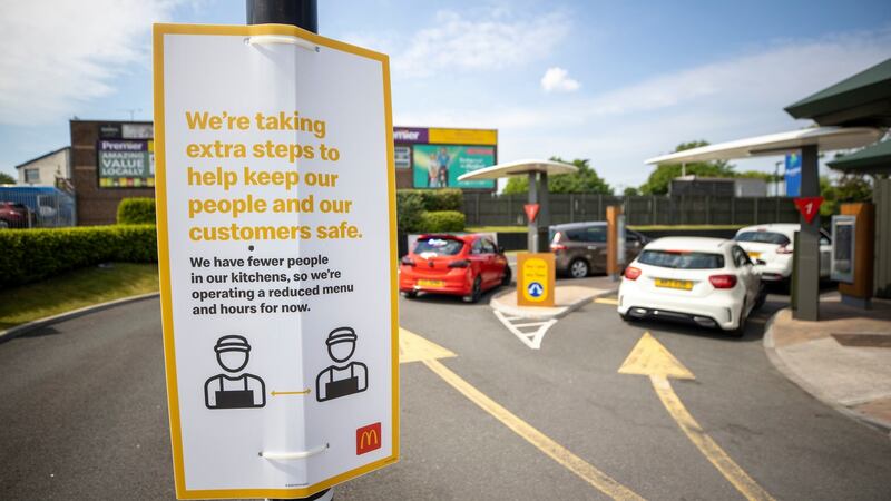 Information signs at a reopened McDonald’s drive-thru at Bloomfield Shopping Mall in Bangor, Northern Ireland. Photograph: Liam McBurney/PA Wire