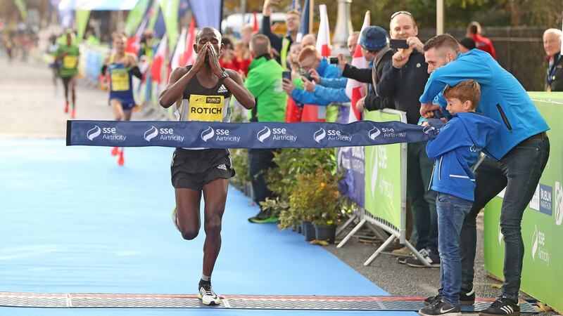 Kenya’s Bernard Rotich crosses the line to win the SSE Airtricity Dublin Marathon in a time of 2:15:53. Photo: Niall Carson /PA Wire