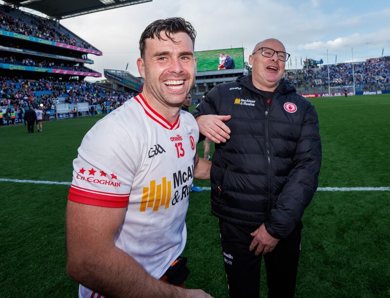 A jubilant Darren McCurry and manager Malachy O'Rourke of Tyrone after beating Dublin. Photograph: Inpho