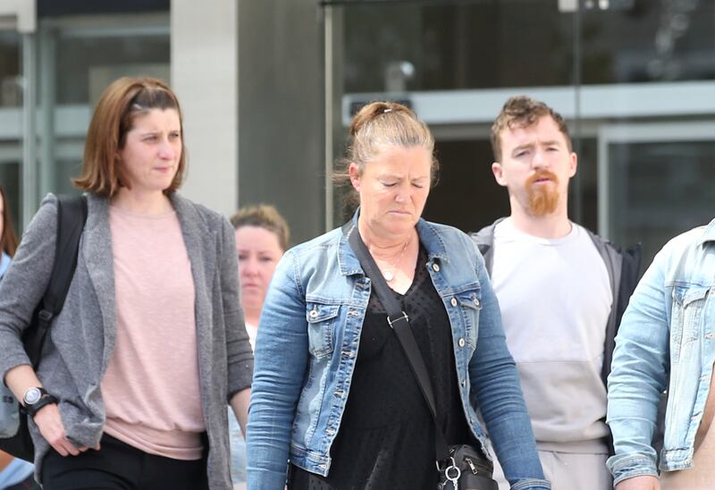 Diane Dunne (centre), mother of Josh Dunne, leaving court with family and friends after George Gonzaga Bento was acquitted of her son's murder. Photograph: Collins Courts