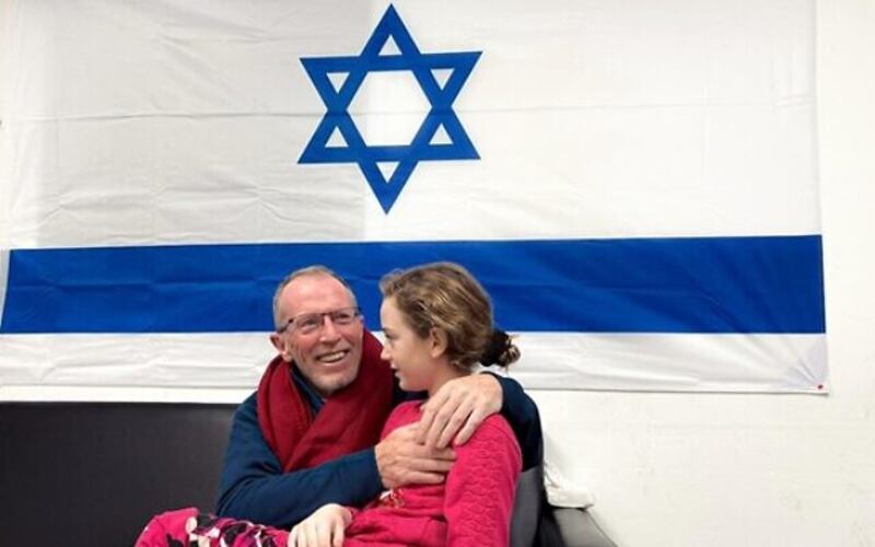 Irish-Israeli national Emily Hand and her father Thomas reunited after her release by Hamas to the Red Cross. Photograph: Israel Defense Forces
