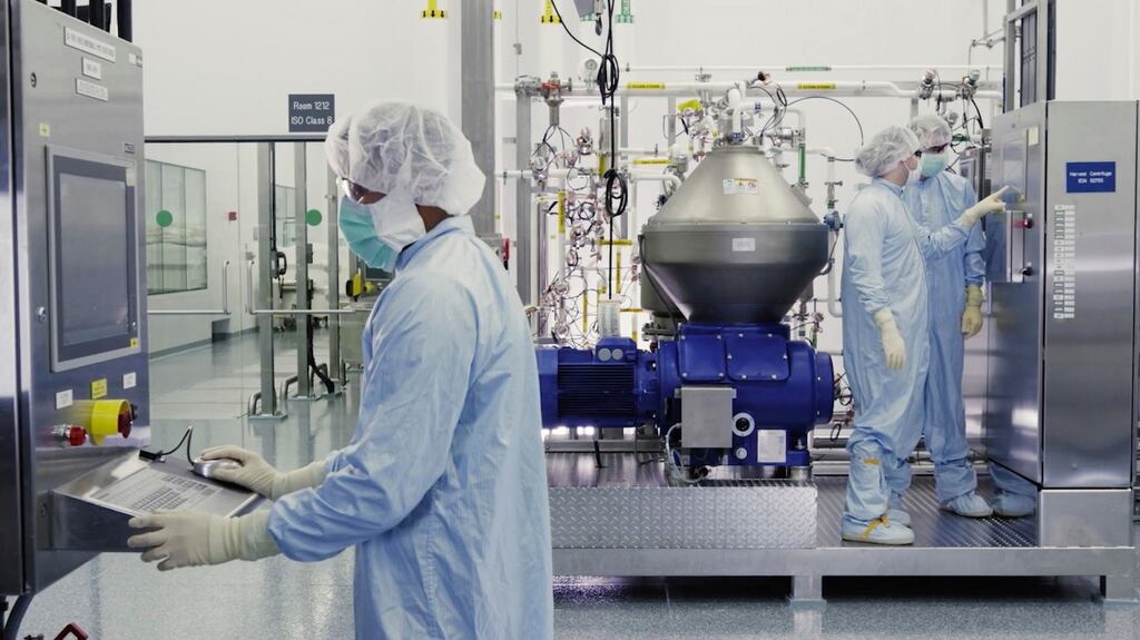 An image  provided by Regeneron Pharmaceuticals showing scientists working with a bioreactor at its facility in New York state. Photograph: Regeneron via AP