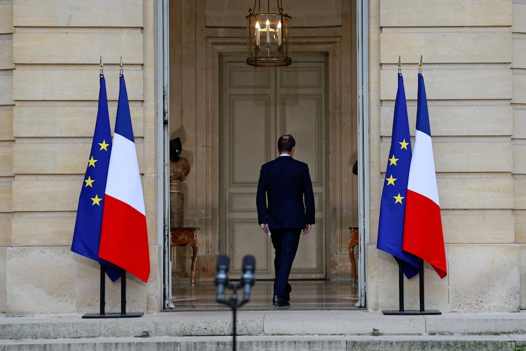 French outgoing prime minister Sebastien Lecornu leaves after delivering a statement on Wednesday about his bid to form a coalition government able to pass an austerity budget. (Photo by Stephanie Lecocq/ AFP)