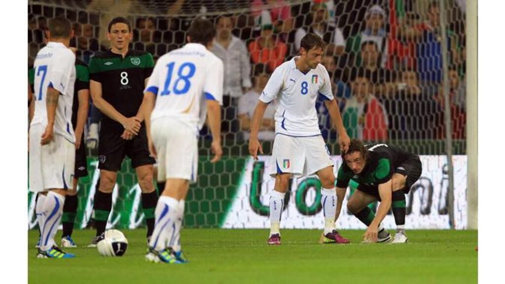 Stephen Hunt prepares to defend a free-kick in the 2-0 win over Italy in Liege, Belgium, on June7th. - (Photograph: Donall Farmer/Inpho)