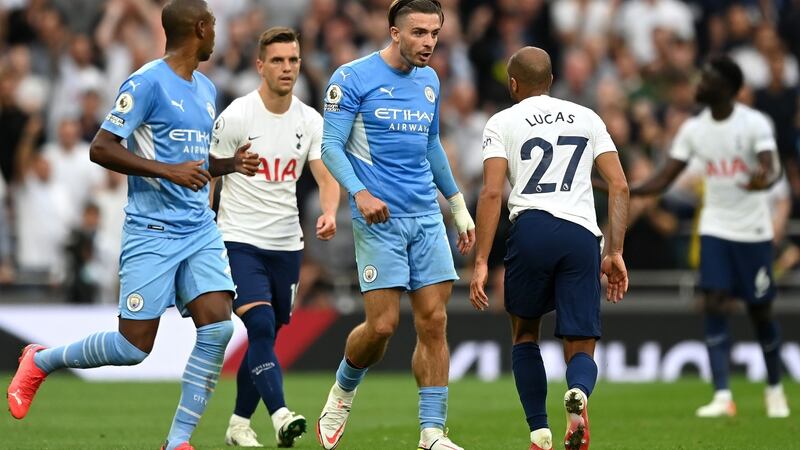 Jack Grealish clashes with Lucas Moura. Photo: Shaun Botterill/Getty Images