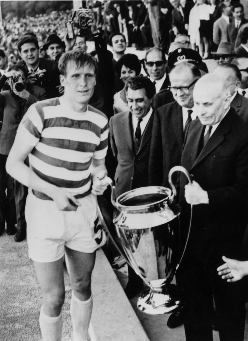 Billy McNeill of Celtic receives the European Cup trophy from the President of Portugal after the Scottish side’s 2-1 victory over Inter Milan in Lisbon in the European Cup final. Photograph: Central Press/Getty Images