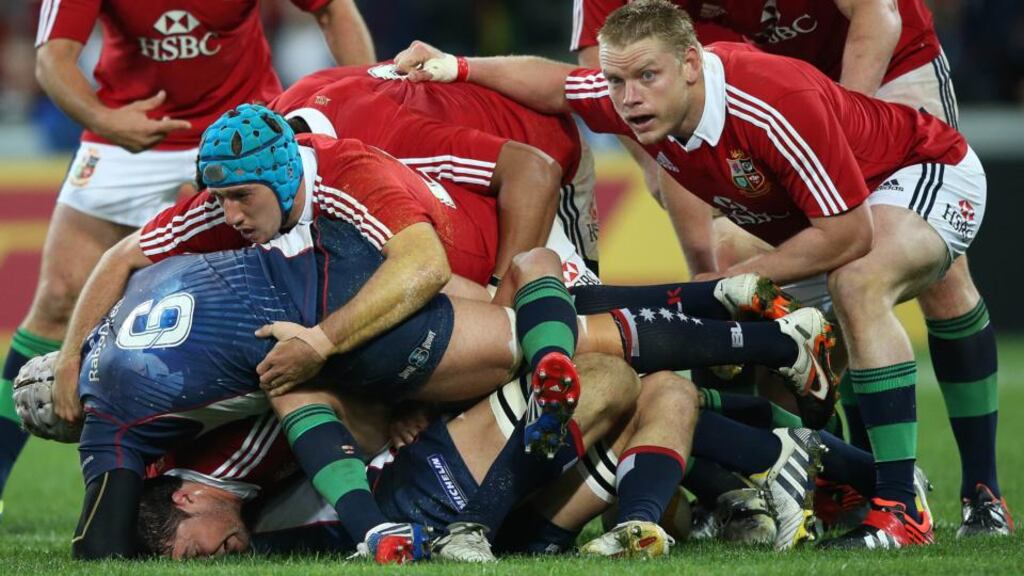 Lions duo Tom Court and Justin Tipuric in action against the Melbourne Rebels yesterday. Photograph: Billy Stickland/Inpho