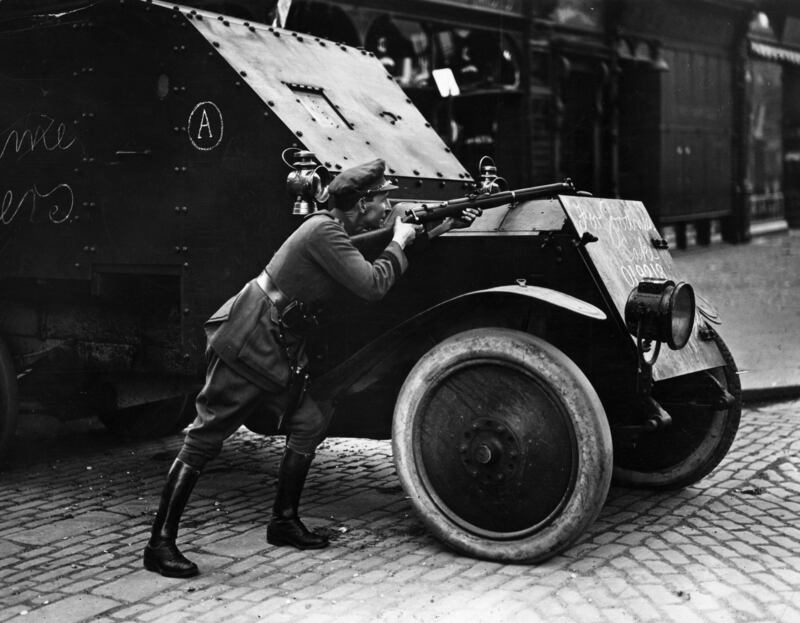 A soldier of the National Army takes aim during the shelling of the Hammond Hotel in Dublin during the Civil War. Photograph: Hulton Archive/Getty Images