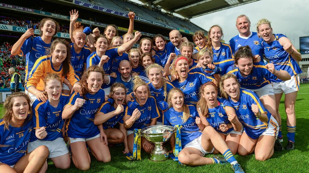 Tipperary players celebrate with the Mary Quinn Memorial Cup following the TG4 Ladies’ Football All-Ireland Intermediate Championship Final against Tyrone at Croke Park. Photograph: Cody Glenn/Sportsfile