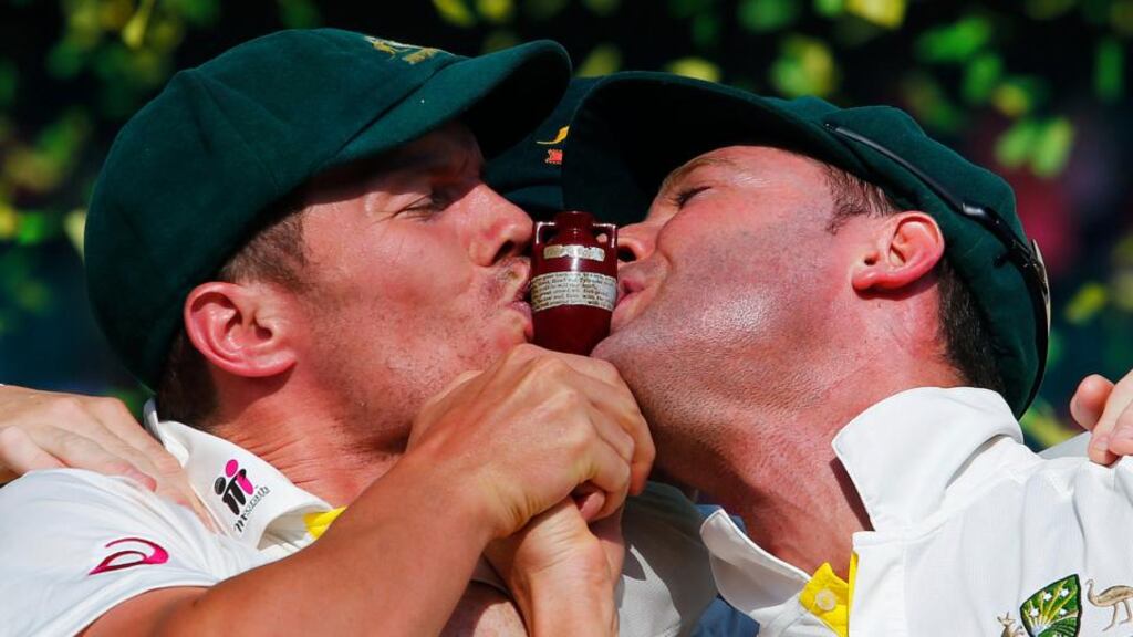 Australia’s captain Michael Clarke (right) and Peter Siddle kiss the replica Ashes urn after winning the fifth Test against England at the SCG. Photograph: Reuters