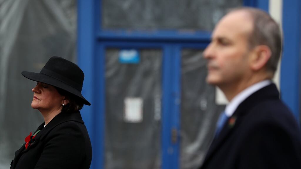 Northern Ireland First Minister Arlene Foster and Taoiseach Micheál Martin during the Remembrance Sunday service at the Cenotaph in Enniskillen. Photograph: Brian Lawless/PA Wire