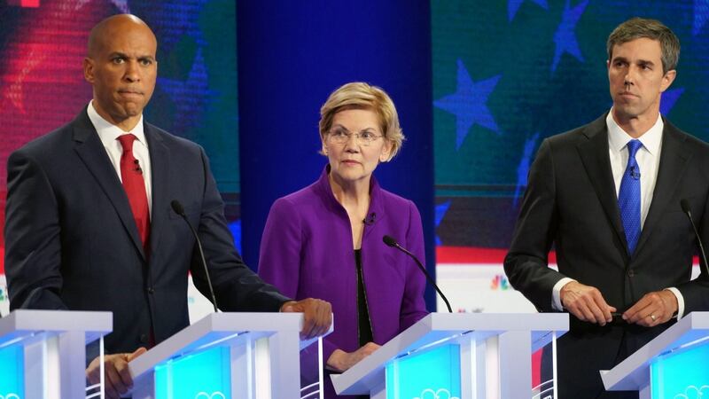 From left: Senator Cory Booker, Senator Elizabeth Warren, and former Republican Beto O’Rourke of Texas during the first Democratic presidential debate in Miami on Wednesday night. Photograph: Doug Mills/The New York Times