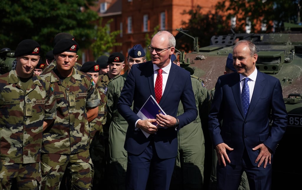 Taoiseach Micheal Martin (right) and Minister for Defence Simon Coveney at the announcement of plans for increased military spending. Picture PA Images