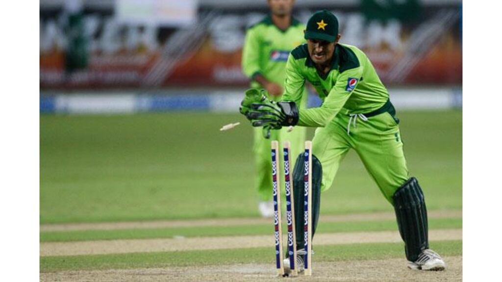 Pakistan's wicketkeeper Zulqarnain Haider takes off the bails to run out South Africa's Rusty Theron during their third one-day international in Dubai (Photograph: Nikhil Monteiro/Reuters)