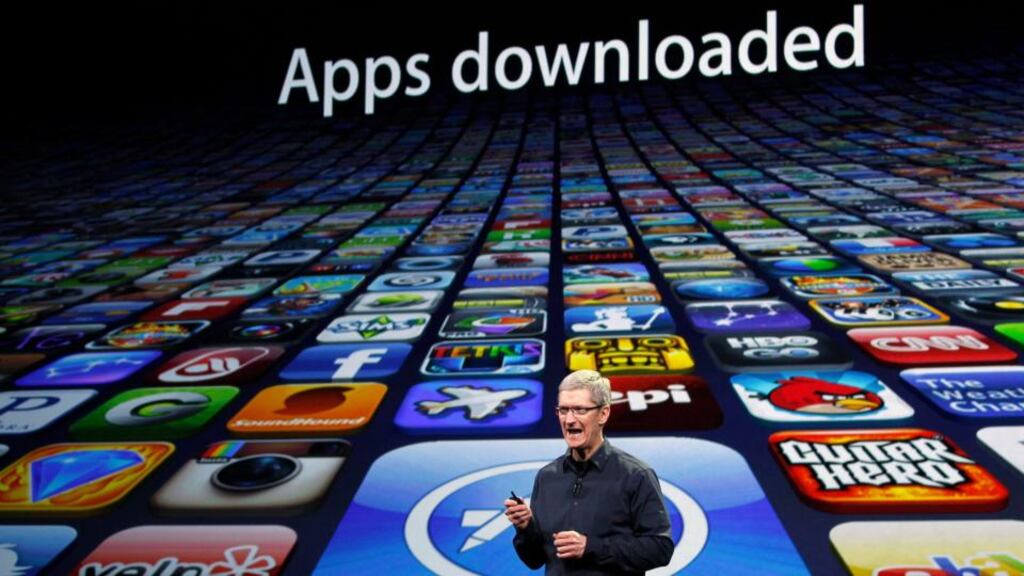 Apple CEO Tim Cook speaking about apps during an Apple event in San Francisco in 2012. Apple will refund consumers at least $32.5 million to settle a longstanding complaints that the technology company billed consumers for charges incurred by children buying mobile apps without their parents’ consent. Photograph: Robert Galbraith/Reuters