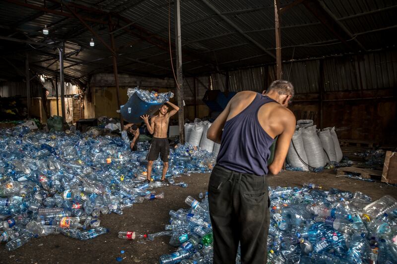 A recycling centre beside Shatila refugee camp, in the southern suburb of Beirut, is still operating despite the regular air strikes. Photograph: Sally Hayden