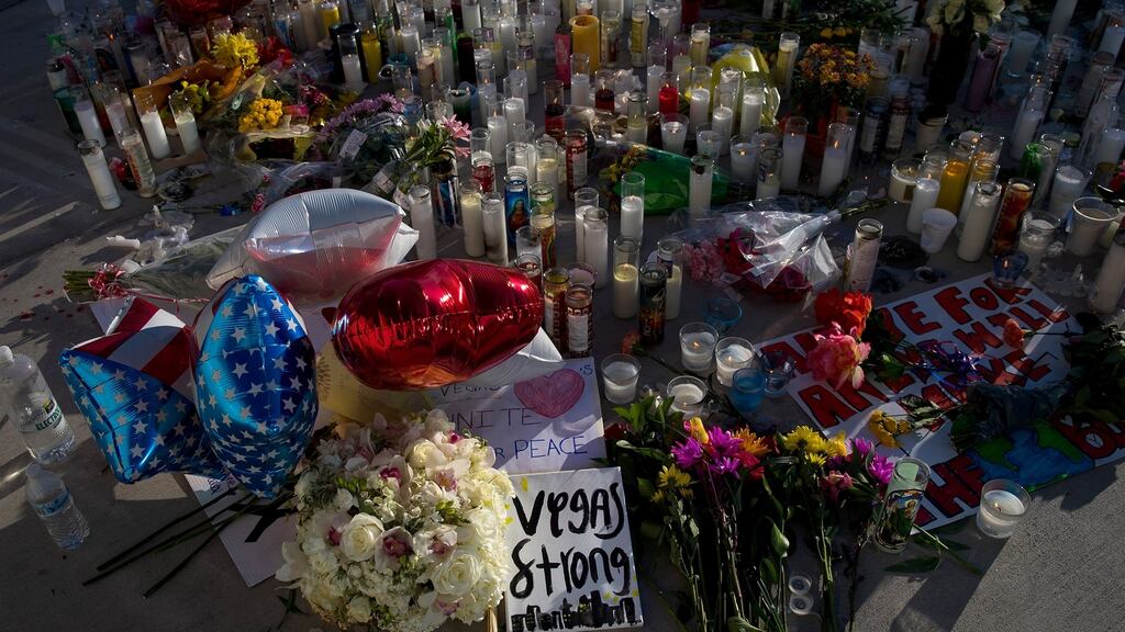A makeshift memorial for the victims of Sunday night’s mass shooting stands at an intersection of the north end of the Las Vegas Strip. Photograph: Drew Angerer/Getty Images