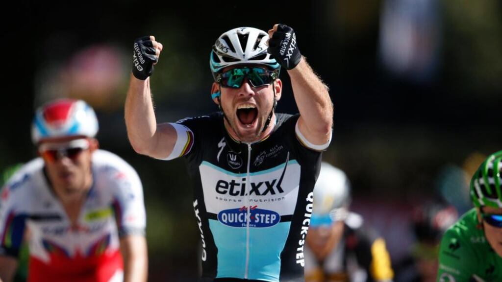 Etixx-Quick Step rider Mark Cavendish celebrates as he crosses the finish line to win the seventh stage of the Tour de France race from Livarot to Fougeres. Photograph: Benoit Tessier/Reuters