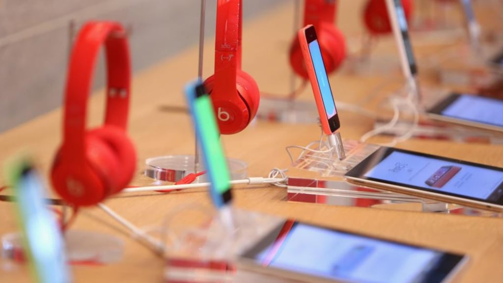 Beats headphones on display alongside iPads and iPhones at the Apple Store in Berlin, Germany. (Photo by Adam Berry/Getty Images for Apple)