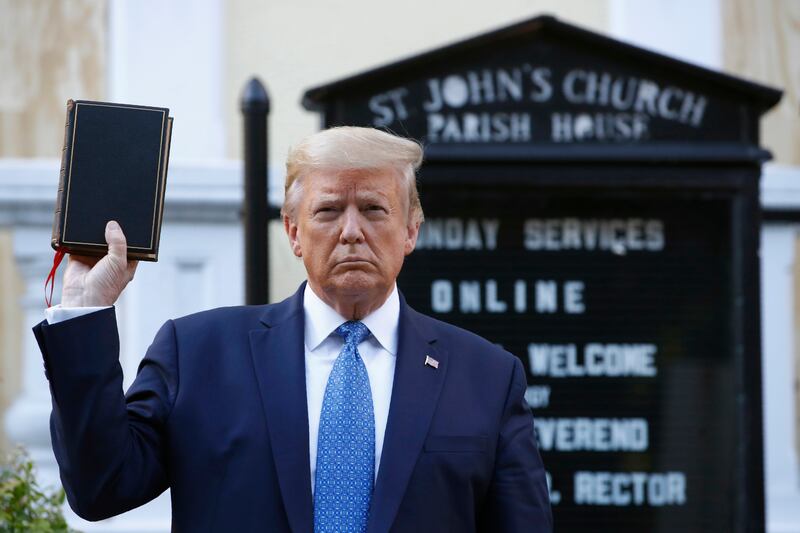 Former president Donald Trump holds a Bible. He is now selling his 'God Bless the USA' edition of the Bible for $59.99. Photograph: Patrick Semansky/AP