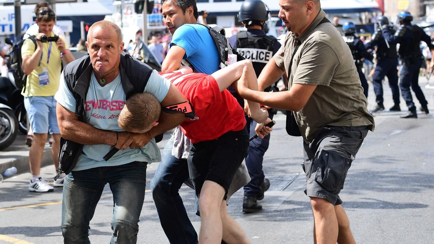 An England fan is detained by French security personnel in the city of Marseille ahead of the Euro 2016 football match between England and Russia. Photo: Getty Images