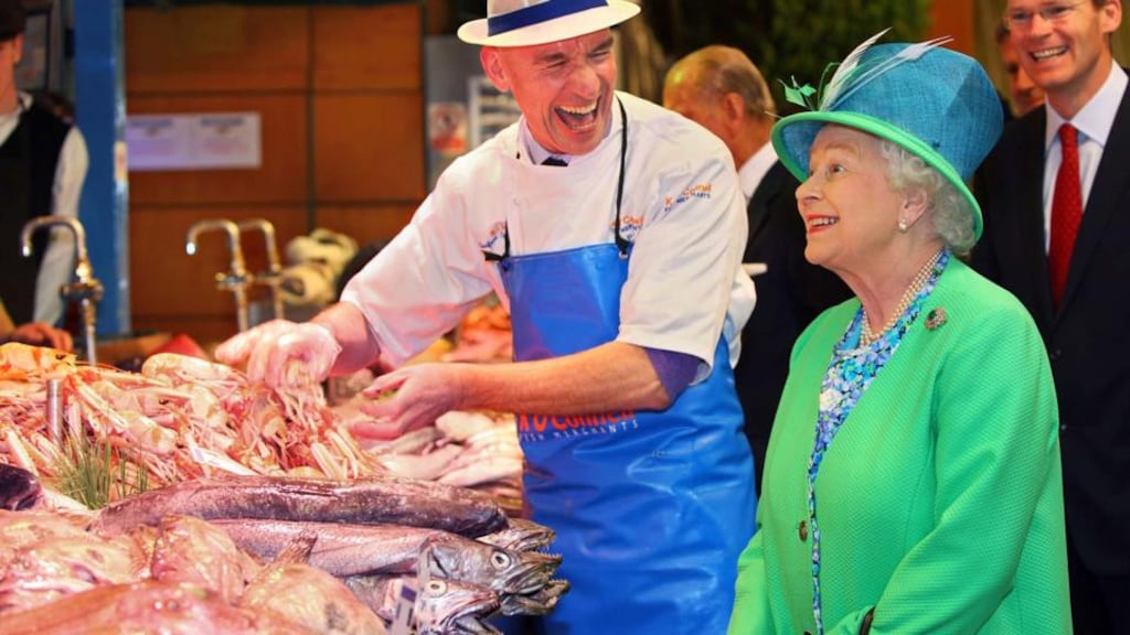 Britain’s Queen Elizabeth meets fish monger Pat O’Connell at the English Market in Cork on May 20th, 2011. Photograph: Maxwell’s/Reuters