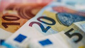 Dublin-based Depfa swings into profit as wind-down accelerates