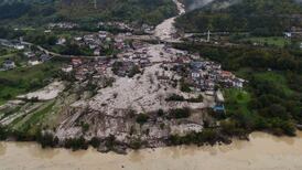 Bosnia floods: Several killed as rescuers search through rubble for missing people