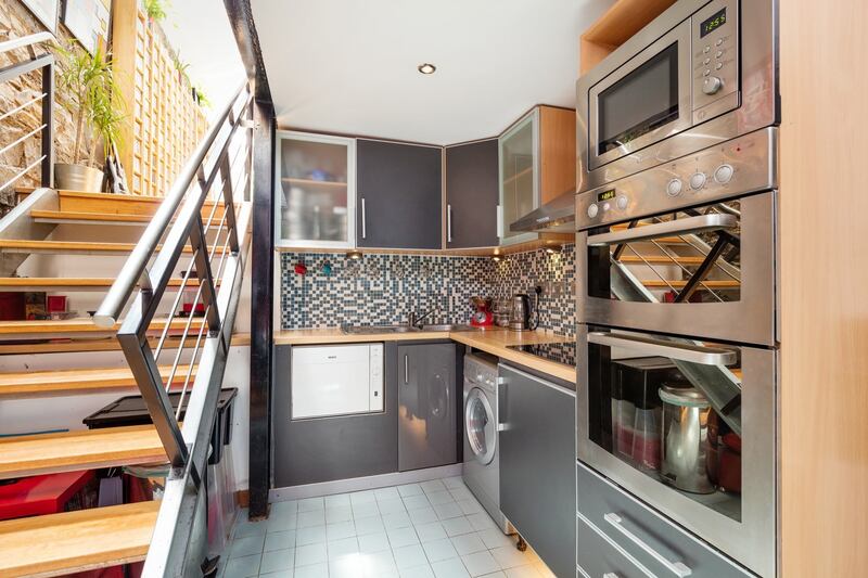 The kitchen and staircase