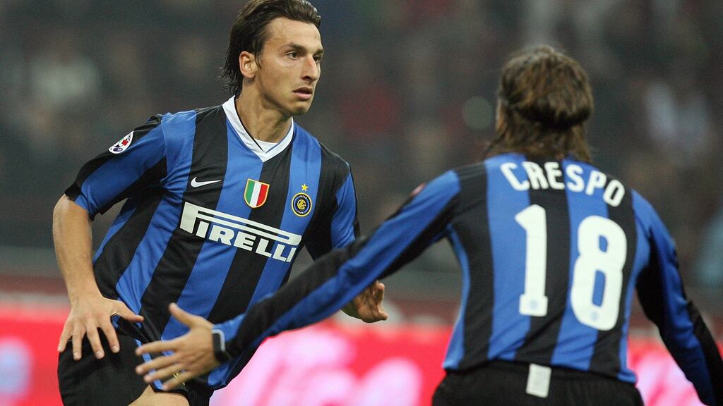 Inter Milan’s forward Zlatan Ibrahimovic is congratulated by his teammate Hernan Crespo after scoring a goal against AC Milan in October 2006. Photo: Paulo Serrinelli/Getty Images