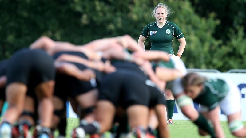 Niamh Briggs looks on as both packs scrum down. Photograph: Dan Sheridan/Inpho