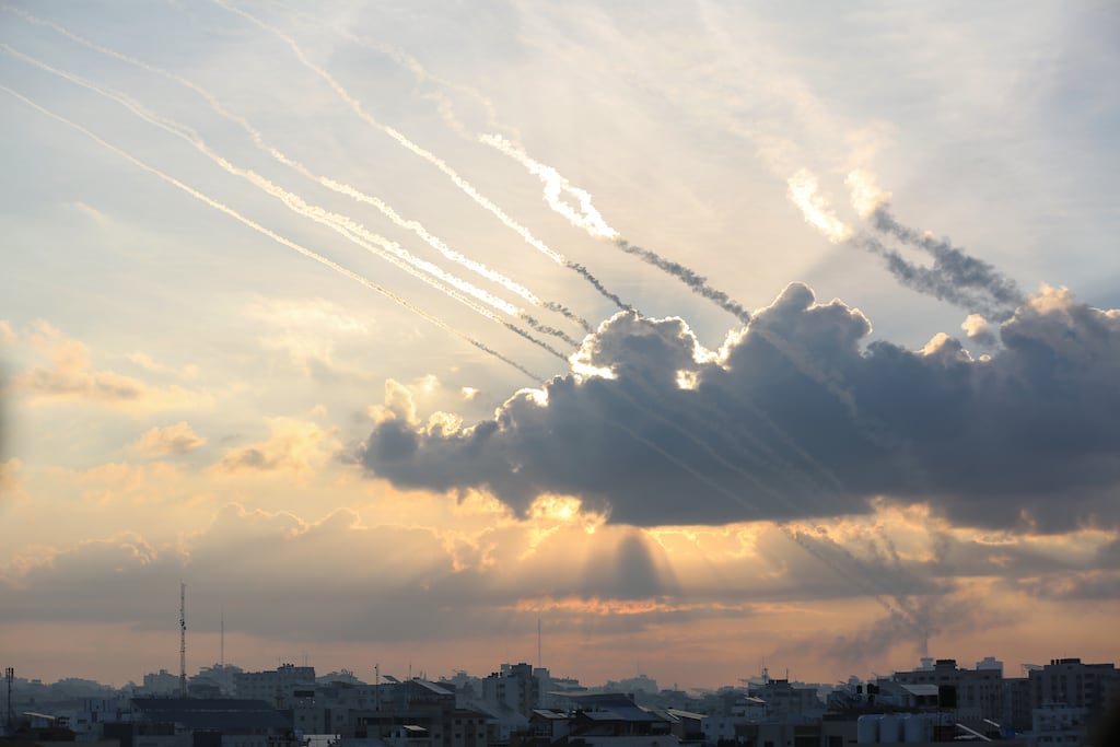 Rocket paths in the skies over Gaza City on Saturday morning. Palestinian militants launched a complex early-morning assault on southern Israel, exposing vulnerabilities that may have long-term consequences for Binyamin Netanyahu. Photograph: Samar Abu Elouf/New York Times
