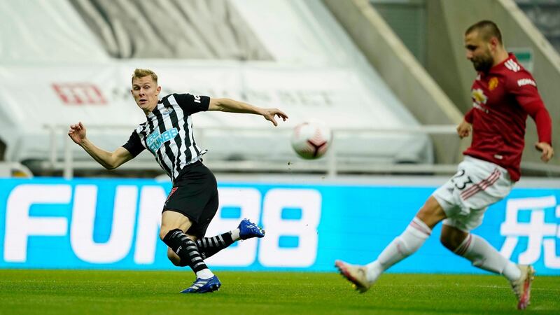 The ball deflects off Luke Shaw to put Newcastle ahead. Photo: Owen Humphreys/PA Wire