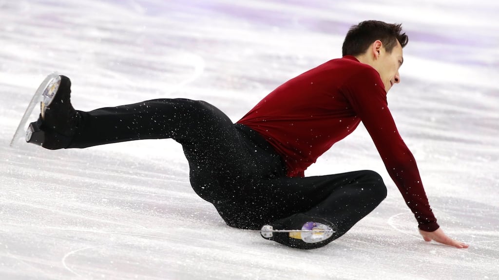 Patrick Chan of Canada falls after a triple axel during the men’s single free skating event at the Gangneung Ice Arena, South Korea, on Monday. Photograph: How Hwee Young/EPA