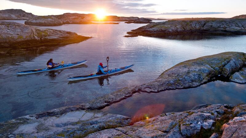 Kayaking around the Bohuslän archipelago. Photograph: Henrik Trygg/imagebank.sweden.se