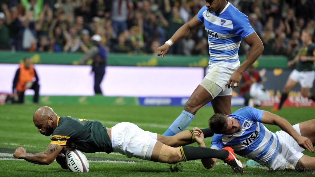 South Africa centre drops the ball as he goes over the Argentina line during the Rugby Championship match at the Mbombela Stadium in Nelspruit. Photograph: Stringer/AFP/Getty Images