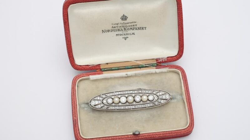 A Swedish natural pearl and diamond brooch, 1910, in its original case