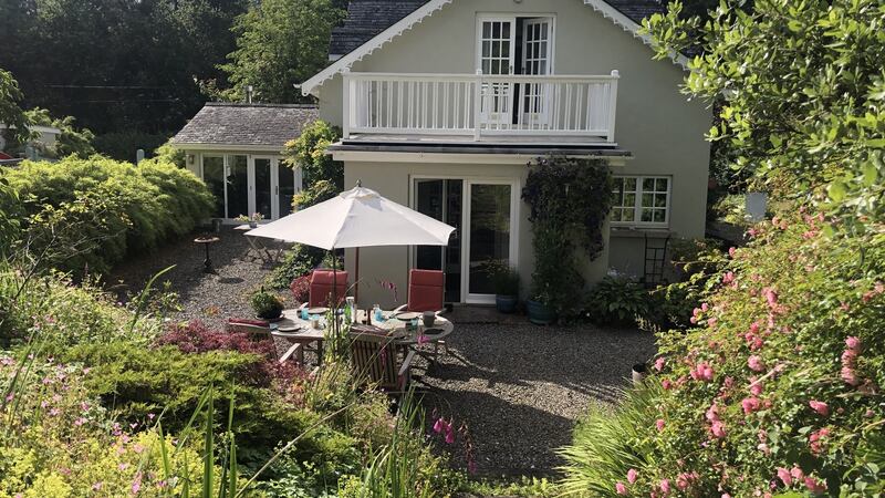 Rear of house with patio and gardens