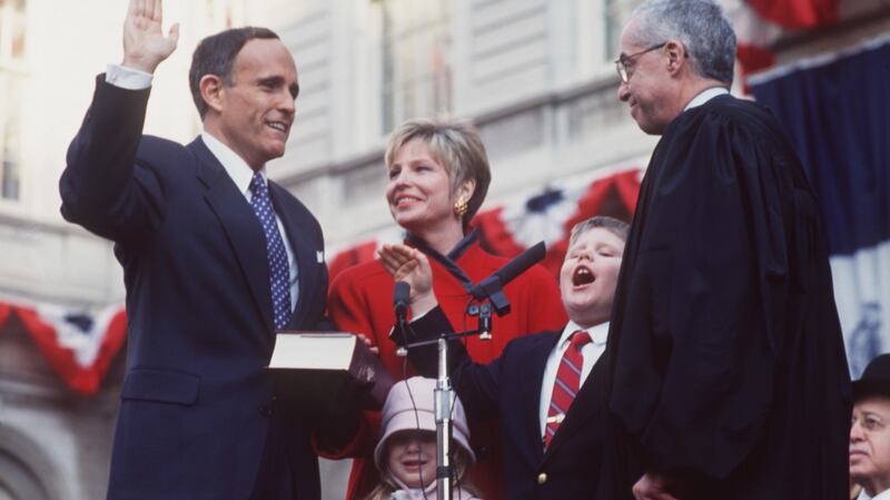 Rudy Giuliani is sworn in as 107th Mayor of New York City, 2nd January 1994. With Giuliani are his wife, Donna, and their children, Andrew and Caroline. Photo: Mark Peterson/Corbis SABA/Corbis via Getty Images