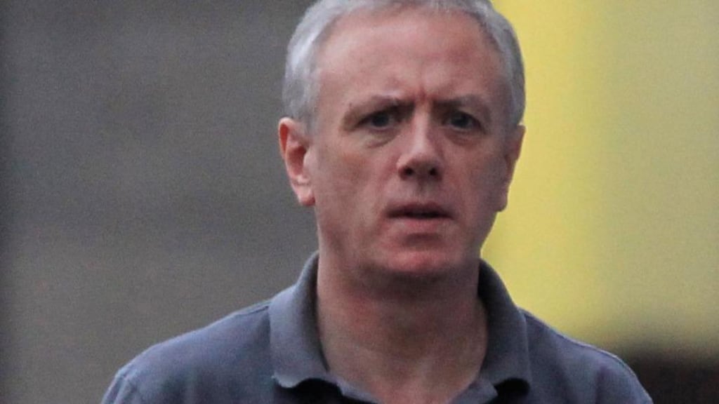 File photograph of Eamonn Lillis being escorted to a prison van. Lillis was jailed in 2010 for the manslaughter of his wife, Celine Cawley. Photograph: Collins Courts