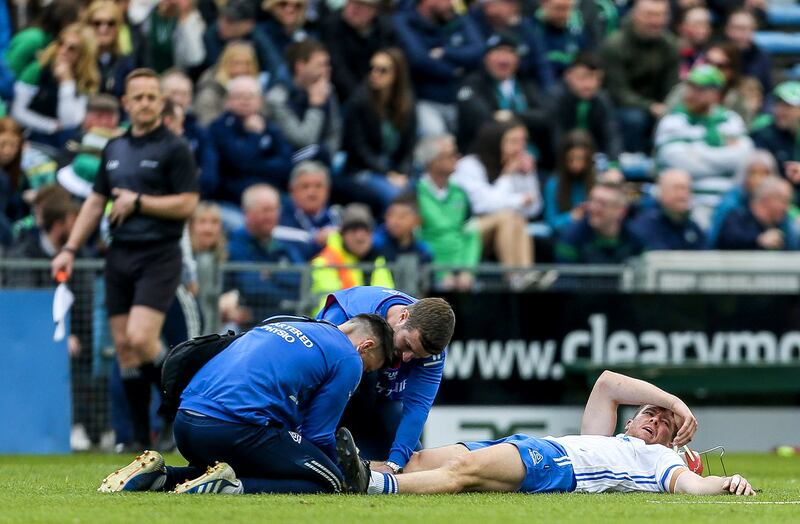 Tadhg De Búrca treated on the pitch before being carried off against Limerick in April 2023. Photograph: Ken Sutton/Inpho