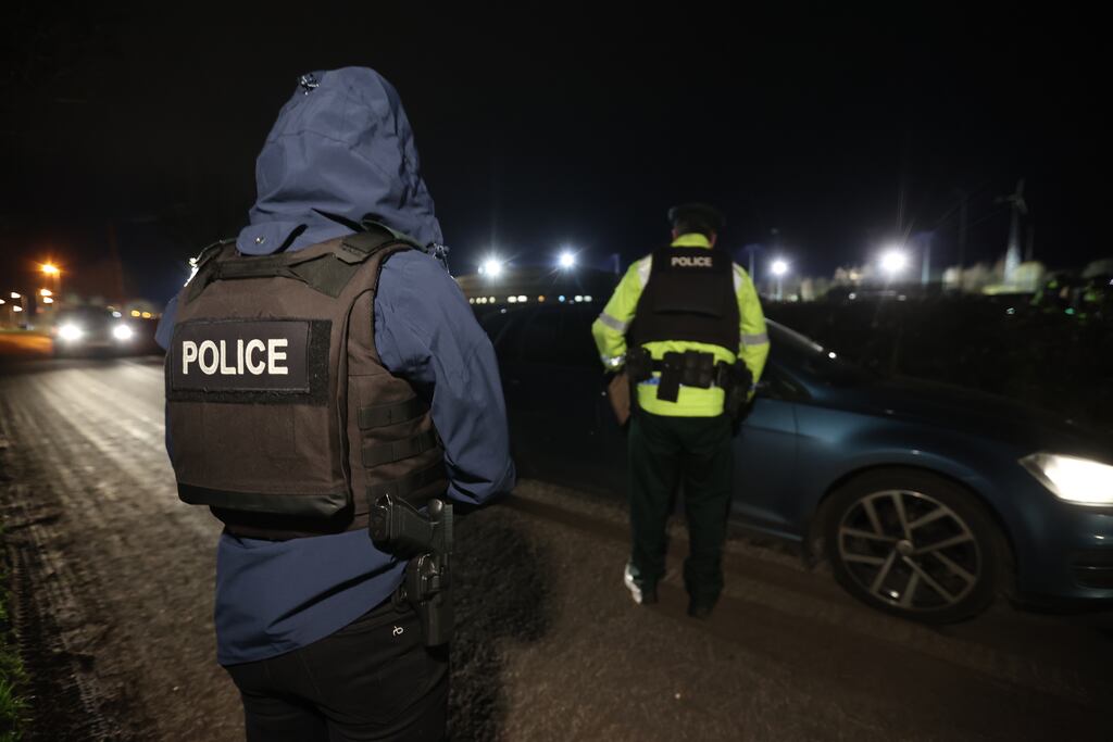 Police officers near the sports complex in the Killyclogher Road area of Omagh, Co Tyrone, one week on from where off-duty PSNI detective chief Inspector John Caldwell was shot a number of times by masked men. Photograph: PA Images