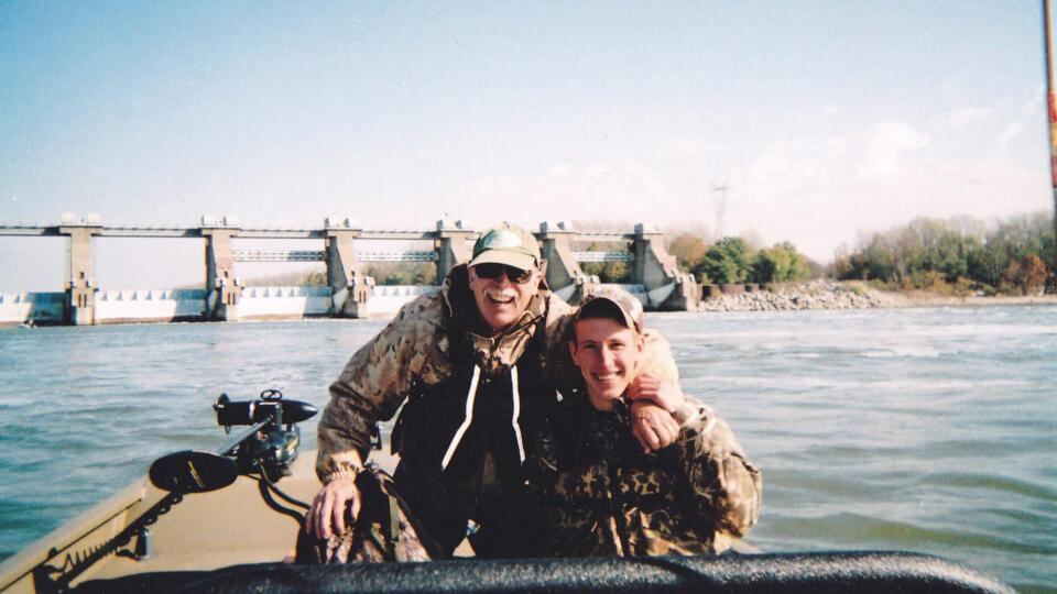 Peter Kassig fishing with his father, Ed Kassig, near the Cannelton Dam on the Ohio River in southern Indiana in 2011 in a photo courtesy of the Kassig family. Photograph: Handout/Reuters