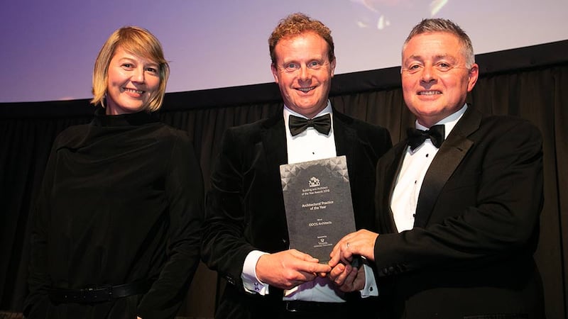 Andrew Treacy, Managing Director, Versatile Bathrooms, Tiles & Stone presents the Architectural Practice of the Year award to Kate Mackrell & David Gogan, ODOS Architects. ODOS Architects.