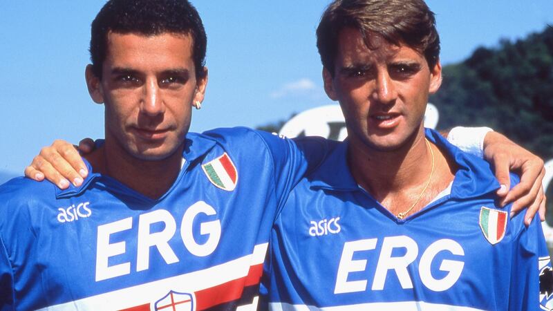 Sampdoria’s Gianluca Vialli embraces Roberto Mancini on pitch durng the 1991 season. File photograph: Getty